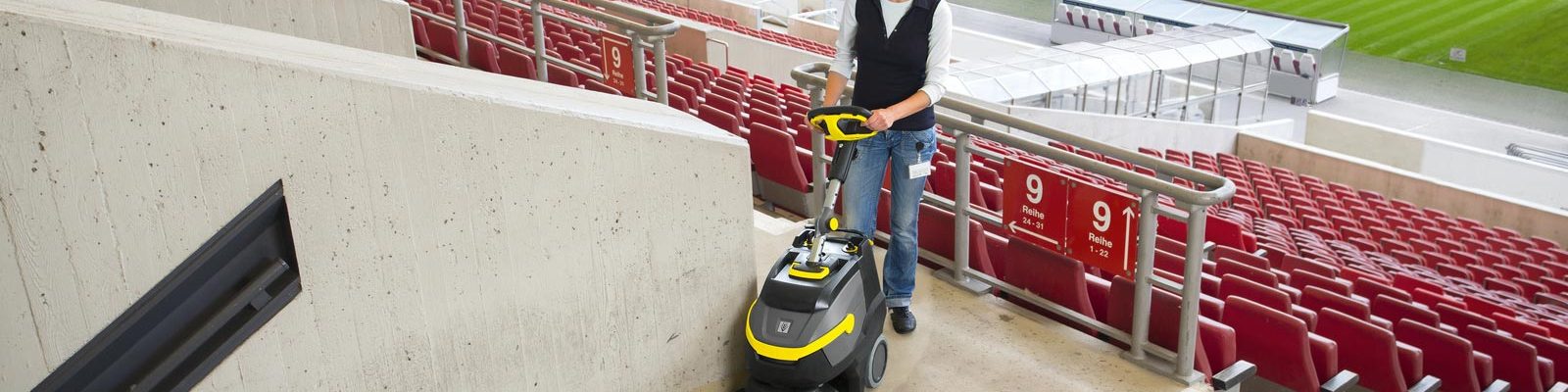 Scrubber dryer cleaning a football stadium