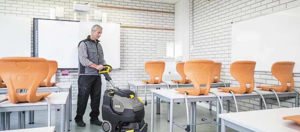 Deep cleaning a school floor with a scrubber dryer